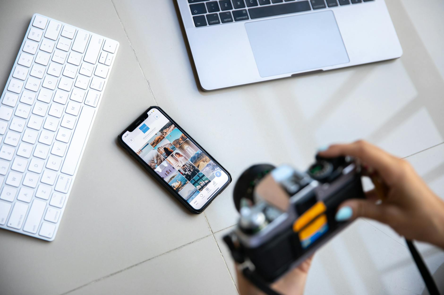 person taking picture of devices